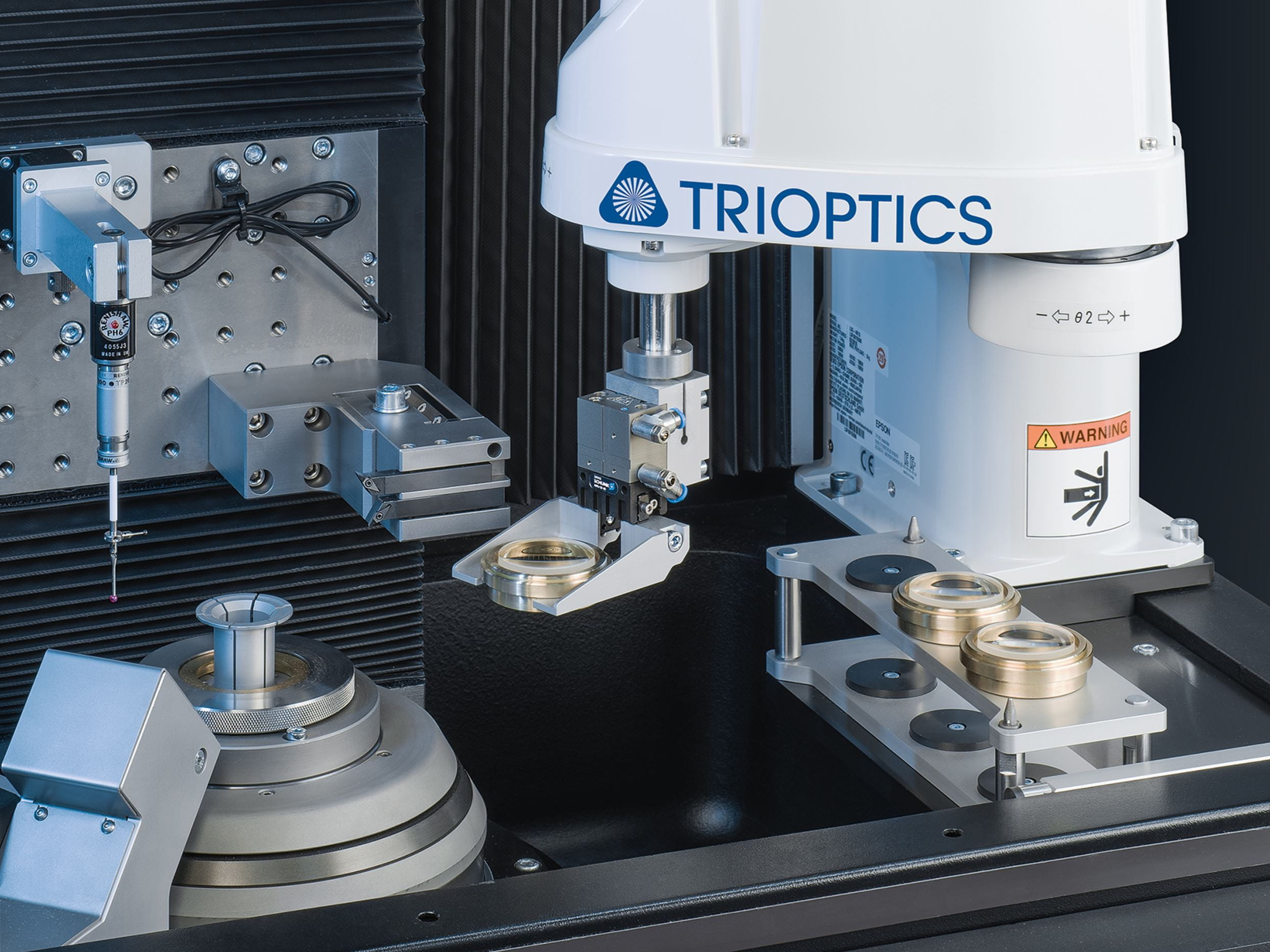 ATS 100 with robot lathe centering mounted lens precise alignment turning station